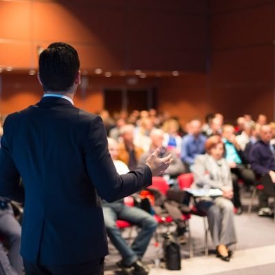 man-speaking-at-a-business-conference-picture-id499517325